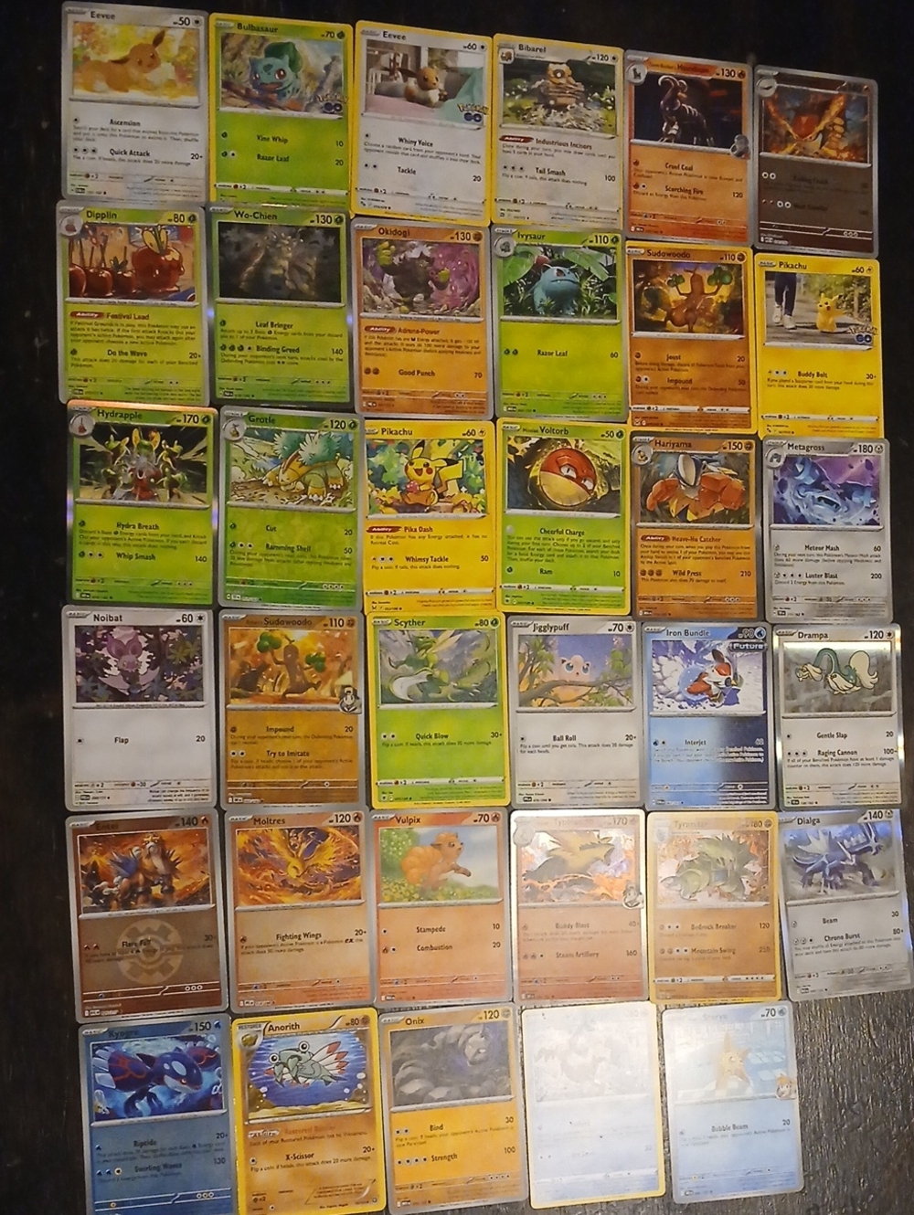 35 Authentic Pokémon Trading Card Lot - Mixed Cards (Yellow/Green/Blue Accents)